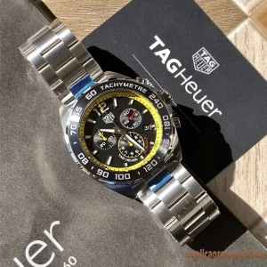 Tag Heuer Formula 1 Nero Lunetta Blu Orologi Replica Bracciale in metallo Uomo Movimento automatico svizzero Orologio Clone 1:1